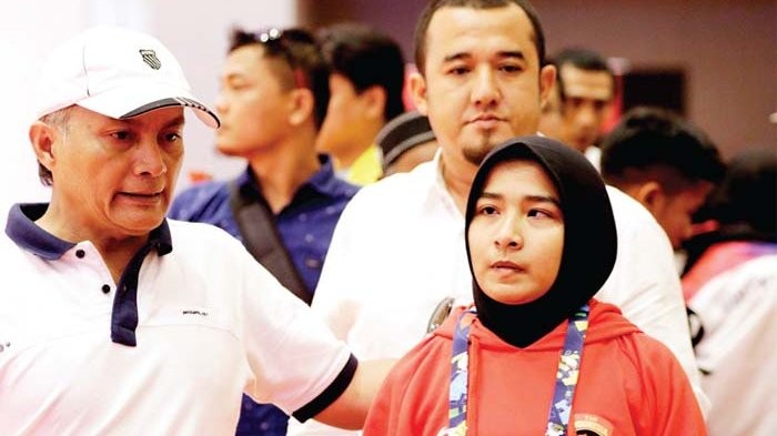 Tolak Lepas Jilbab, Pejudo Asal Aceh Didiskualifikasi Artikel ini telah tayang di serambinews.com